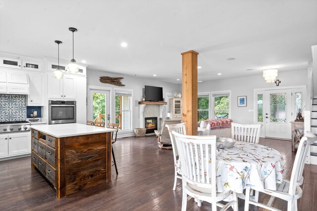 554 Hayes Ridge Rd, Indian Mound, TN 37079 - interior space featuring dark hardwood / wood-style floors, a chandelier, and a healthy amount of sunlight