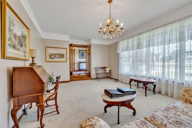 living room with an inviting chandelier and light colored carpet