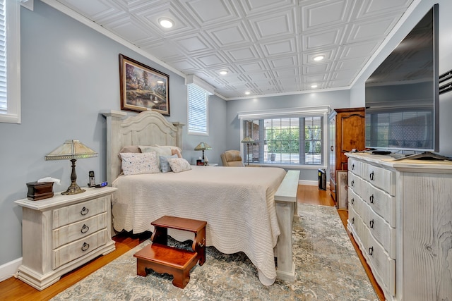 bedroom featuring light hardwood / wood-style floors