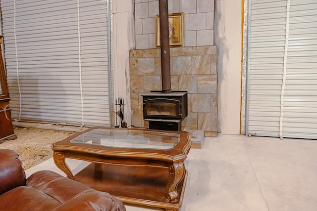 living room with a wood stove