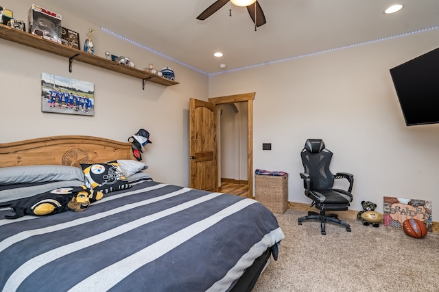 bedroom featuring ceiling fan and carpet flooring