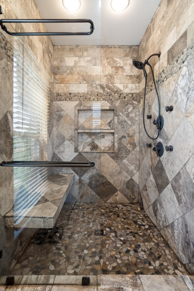 bathroom featuring an enclosed shower