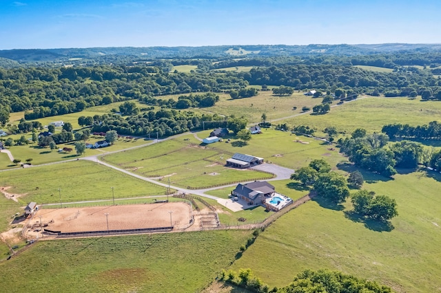 birds eye view of property with a rural view