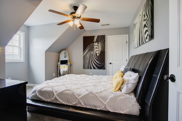 bedroom with ceiling fan and carpet flooring