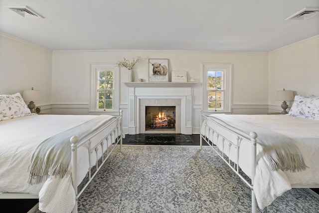 bedroom with crown molding and dark wood-type flooring