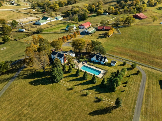 birds eye view of property featuring a rural view