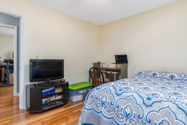 bedroom with light hardwood / wood-style flooring