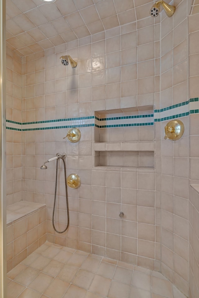 bathroom featuring a tile shower