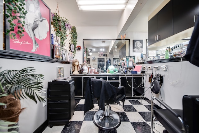 miscellaneous room featuring light tile floors