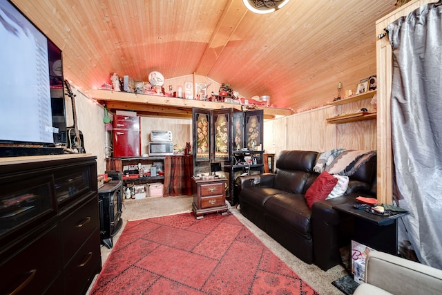 living room featuring lofted ceiling, wood ceiling, and carpet