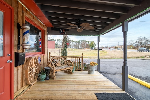 wooden terrace with ceiling fan