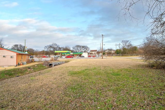 view of yard with central AC unit