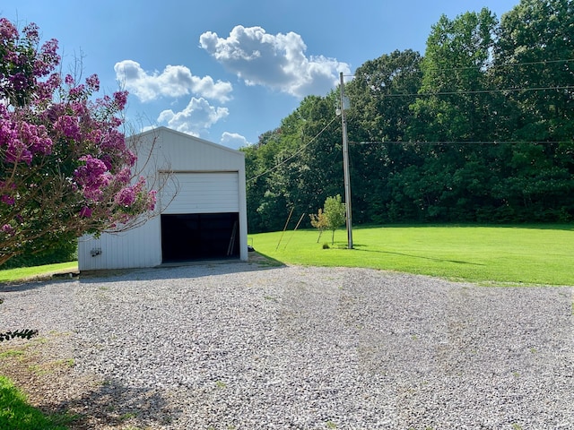 garage with a lawn