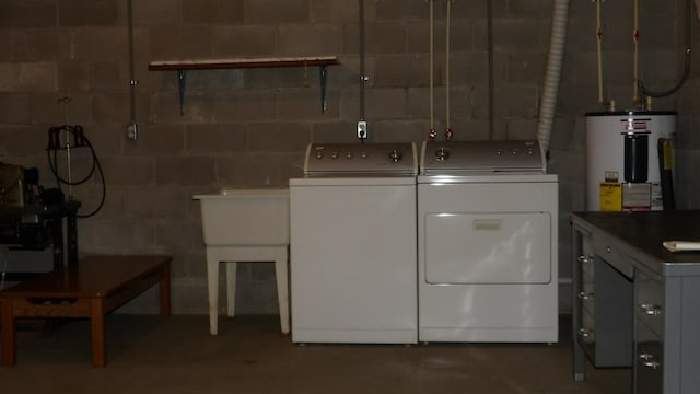 laundry area featuring washer and dryer, hookup for a washing machine, and water heater