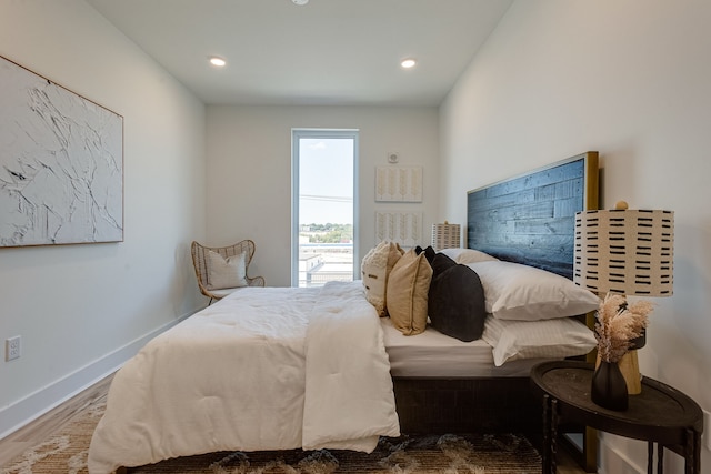 bedroom featuring wood-type flooring