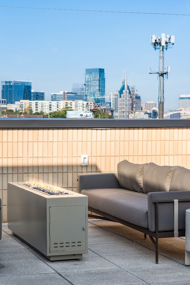 view of patio / terrace featuring a fire pit