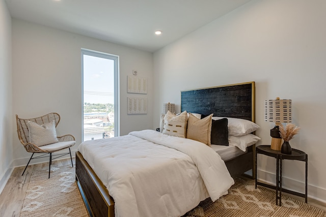 bedroom with light wood-type flooring