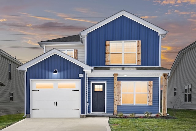 view of front of property with a garage