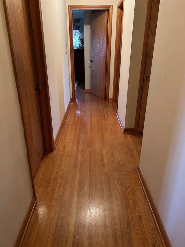 hallway featuring light wood-type flooring