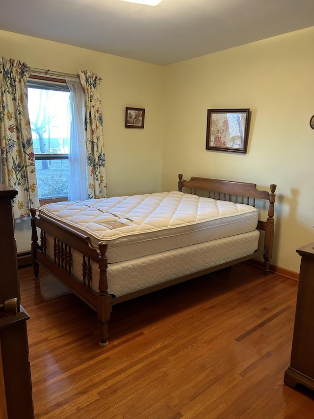 bedroom featuring hardwood / wood-style floors