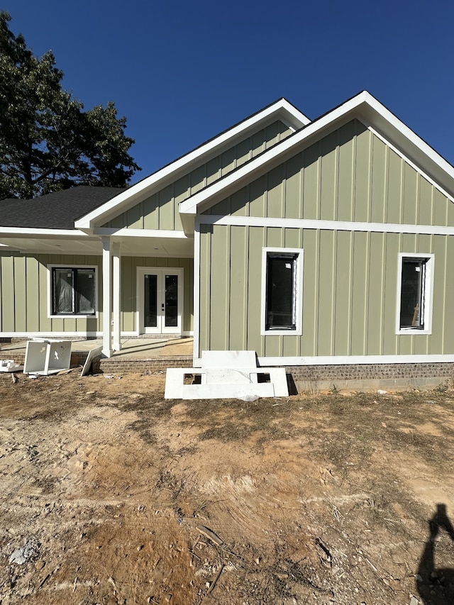 back of house featuring french doors