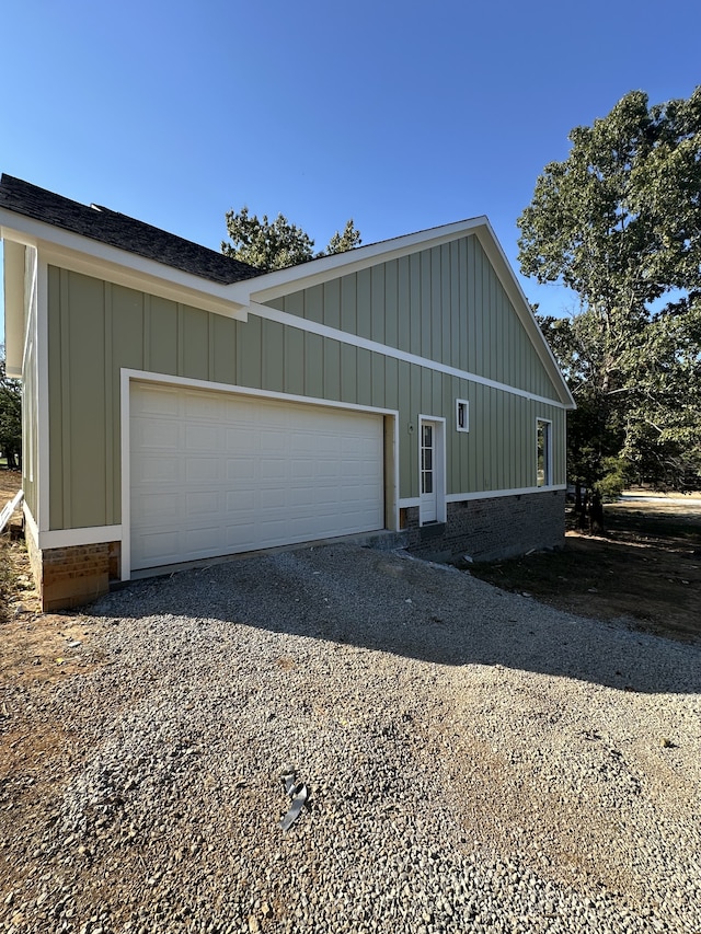 view of property exterior featuring a garage