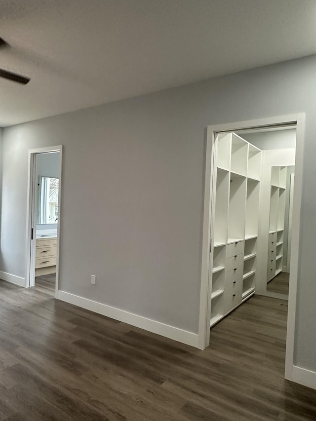 spare room with dark hardwood / wood-style floors