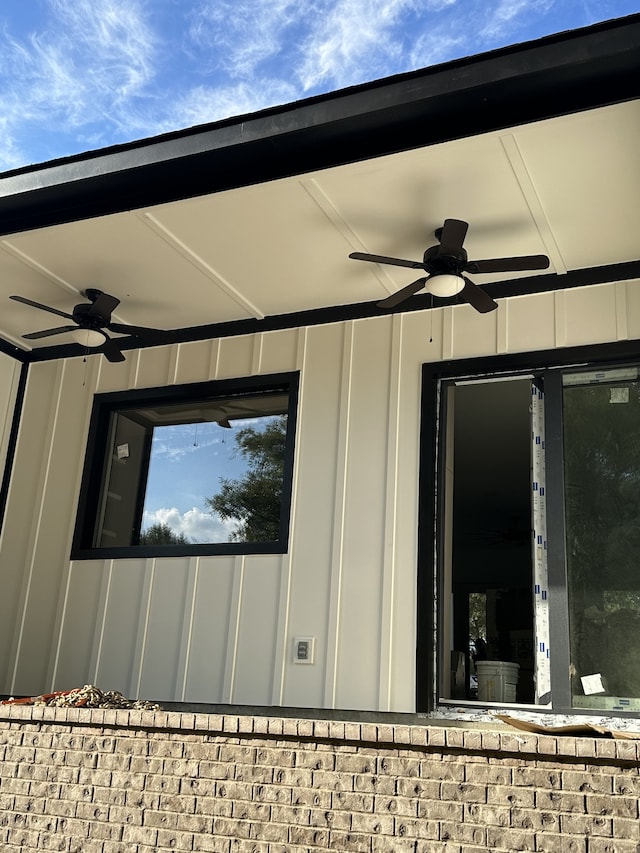 exterior details featuring ceiling fan