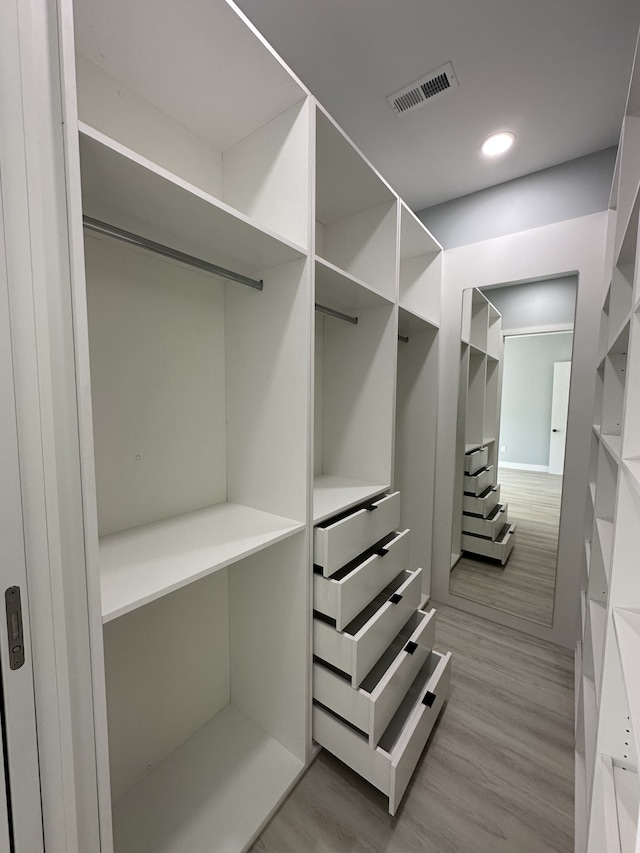 walk in closet featuring light wood-type flooring