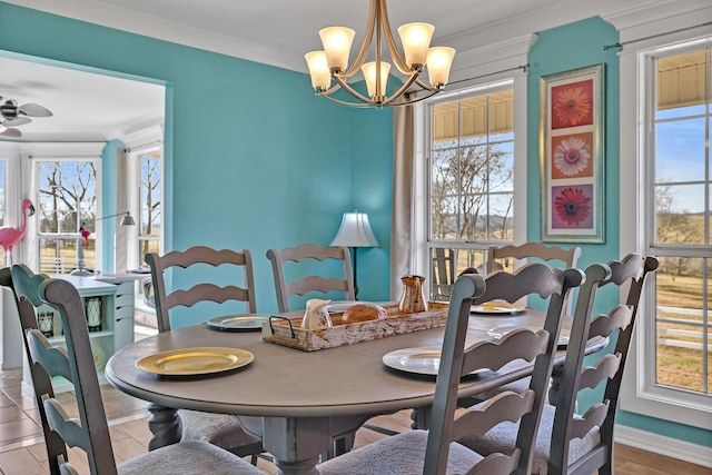 dining room featuring hardwood / wood-style flooring and a healthy amount of sunlight