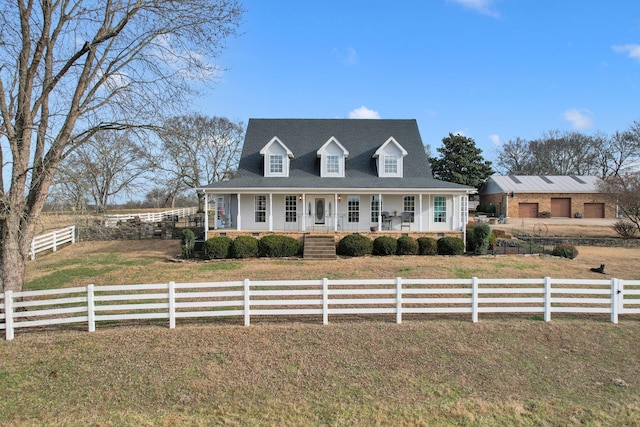 new england style home featuring a porch