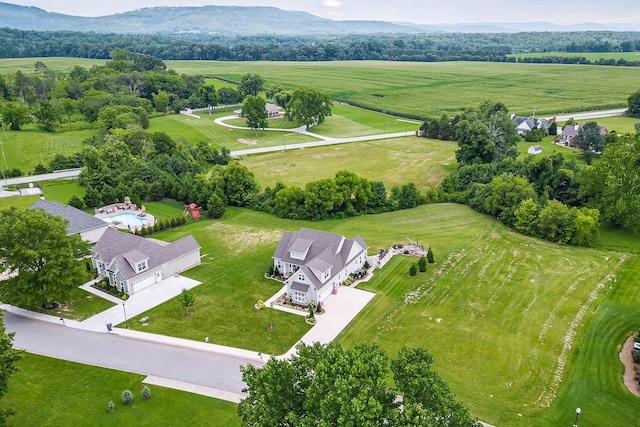 bird's eye view with a mountain view and a rural view