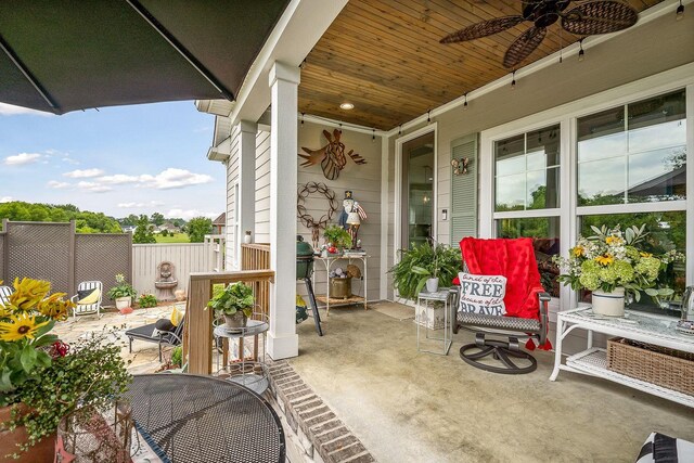 view of patio featuring ceiling fan