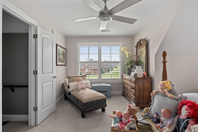 sitting room featuring light carpet and ceiling fan