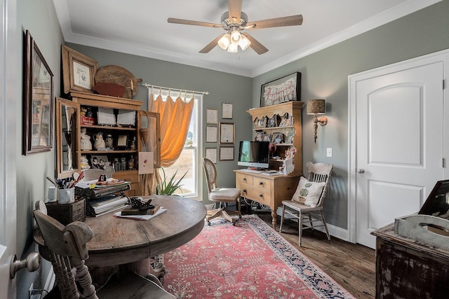 office featuring ceiling fan, ornamental molding, and dark hardwood / wood-style flooring