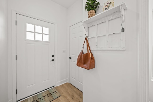 doorway to outside featuring light hardwood / wood-style floors