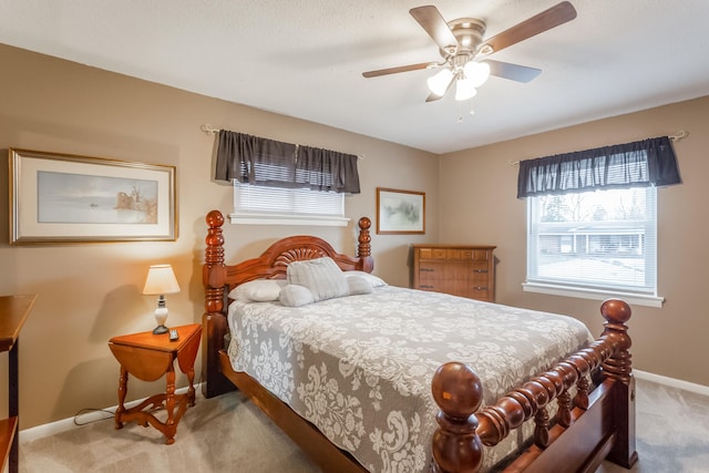 bedroom featuring ceiling fan and carpet flooring