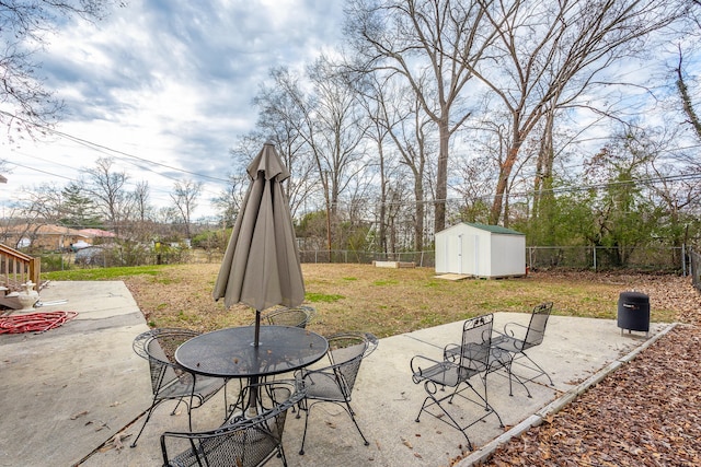 view of patio featuring a storage shed