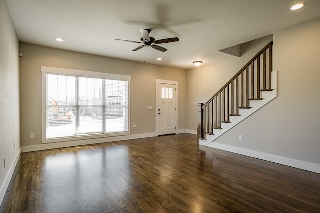 entrance foyer featuring ceiling fan and dark hardwood / wood-style floors