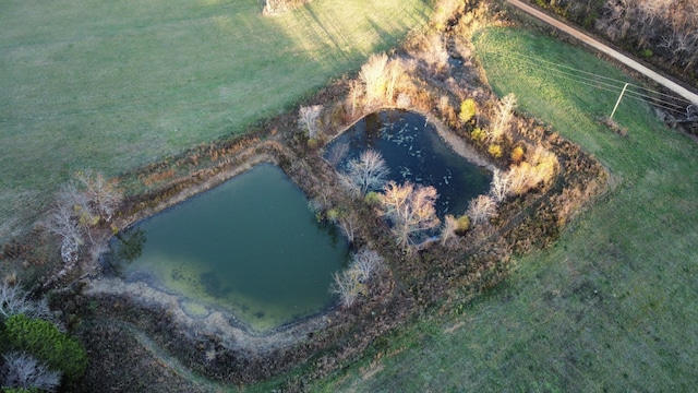 bird's eye view with a water view