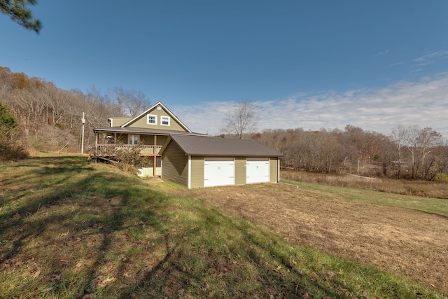 exterior space with a yard and covered porch