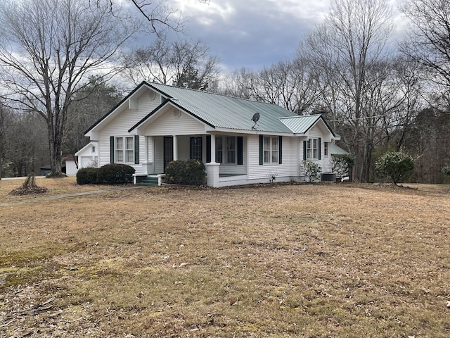 ranch-style home featuring central air condition unit and a porch