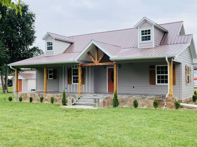 view of front facade with a porch and a front lawn