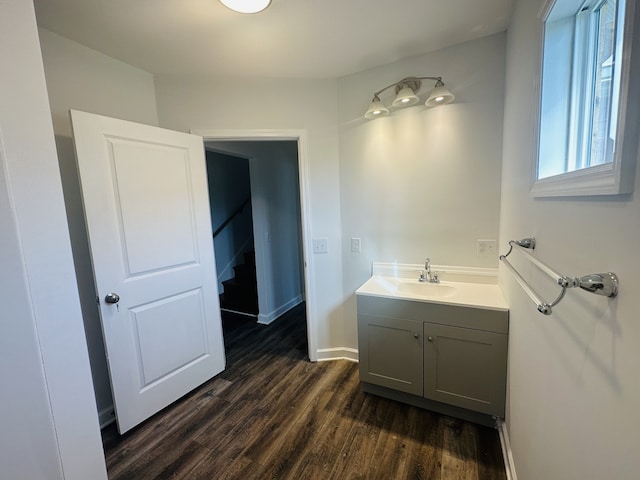 bathroom featuring vanity and wood-type flooring