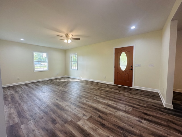 entrance foyer featuring dark hardwood / wood-style flooring and ceiling fan