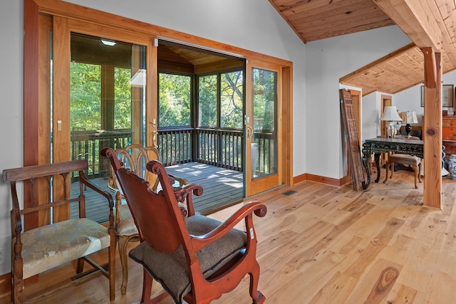 interior space with wood ceiling and vaulted ceiling