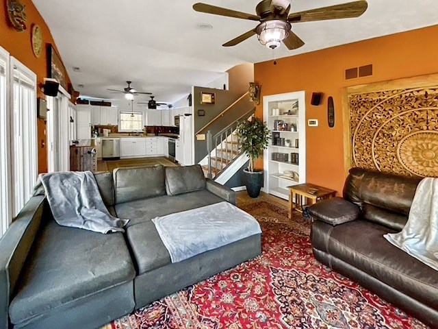 living room with ceiling fan