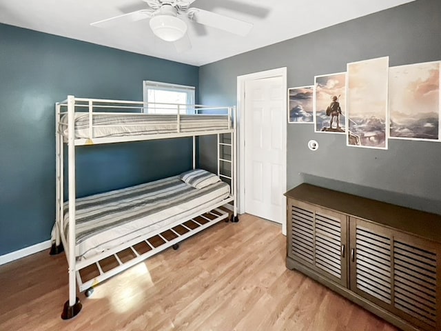 bedroom featuring ceiling fan and light hardwood / wood-style floors