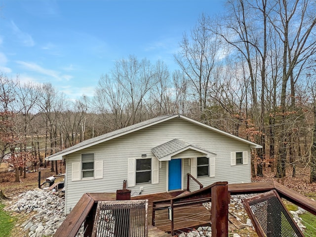 view of front of home with a wooden deck