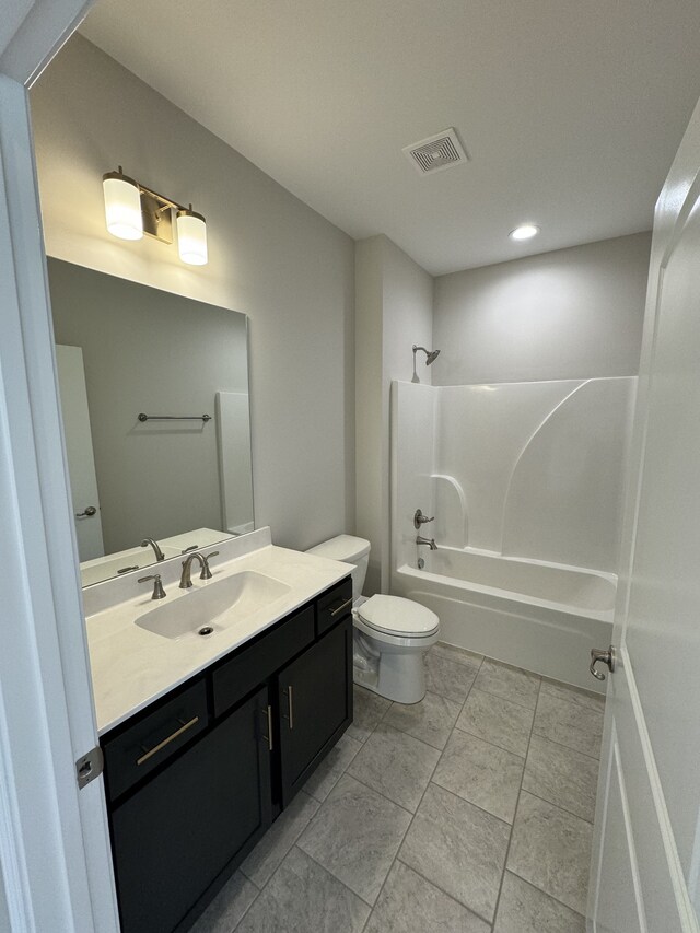 full bathroom with vanity, toilet, and shower / bath combination